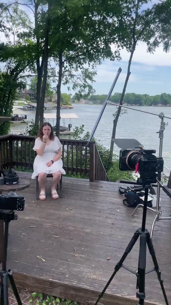 Lakeside portrait session set up with camera on tripod