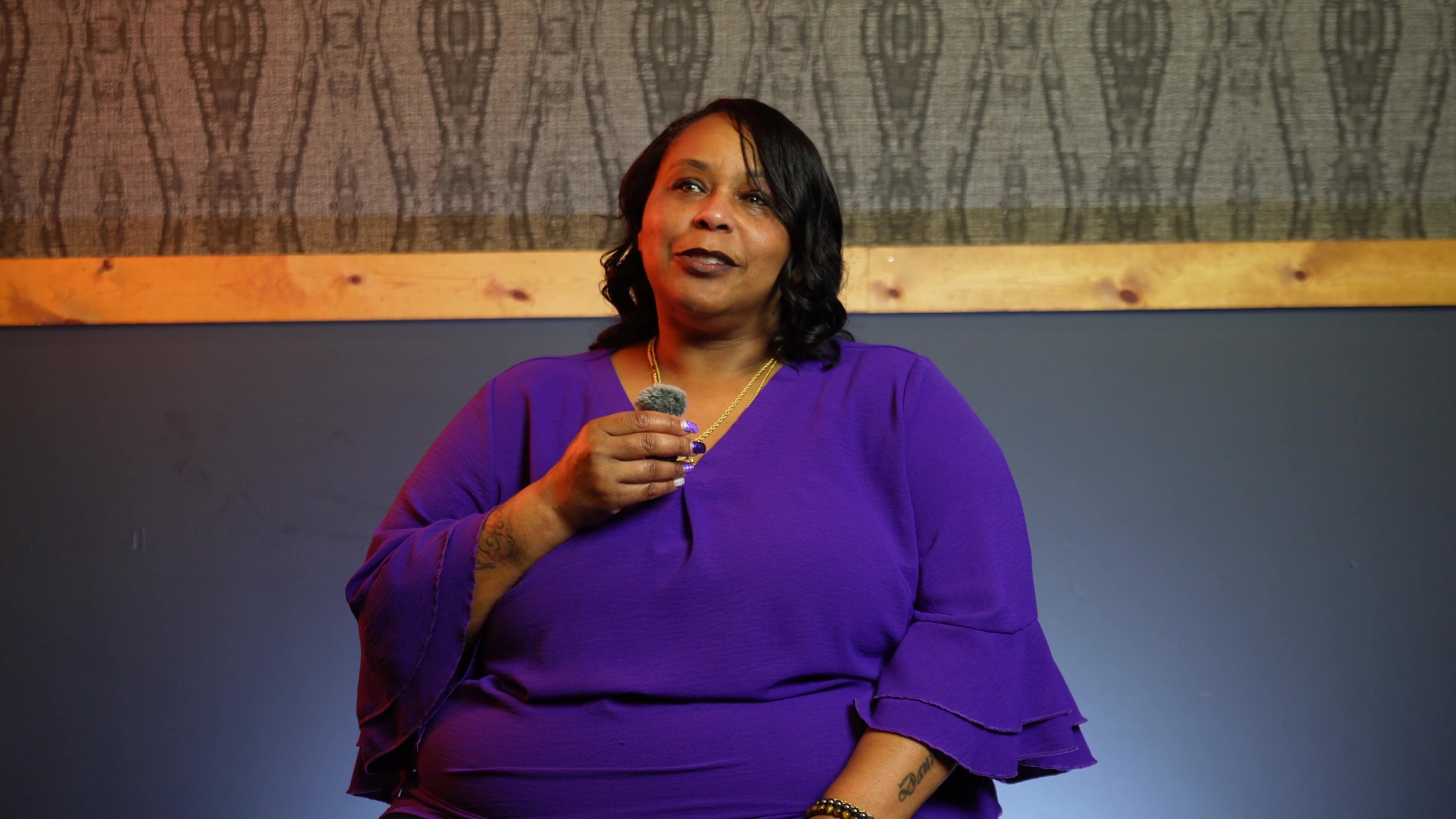 DeAngela Taylor, Broker Owner of She's Your Lender, on set during a brand video shoot